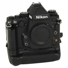 the nikon df camera is shown with its lens up and ready to take pictures