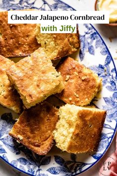 cheddar jalapeno cornbread with jiffy on a blue and white plate