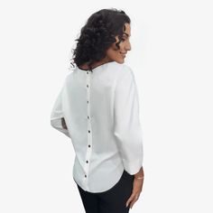 This blouse is not only a fashion statement but is pleasingly comfortable too. Made from soft and flowy material, it feels like a feather against your skin. The graphic detail on this blouse is an elegant celebration of art and pattern. Its back showcases an elegant row of buttons, adding a sophisticated touch to the overall design. View the fit type tab to see how it fits. Asymmetrical Blouse, Blouse Sale, Polka Dot Blouse, Printed Blouse, Body Types, Your Skin, Fashion Statement, The Row, Skin