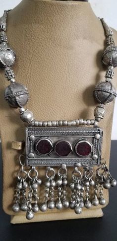 Dear Byers, I'm offering a gorgeous piece from my collection Antique Silver Yemeni Tribal Bedouin Necklace handmade with Agate stone 194 G Basic information  Length  33 CM  Wight 194G   very good condition  there are beautiful and wonderful pieces please visit our store. However, since this is a beautiful lovely Pre-Owned item, it is unique. And it is satisfactory to use. If you find yourself attracted to it, I highly recommend that you start Buy It Now! Shipping I do ship worldwide by registered mail fast shipping 8 to 10 days with DHL and FedEx tracking number!  Small packages are registered with tracking number will ,  Shipments take 8to 10 days . All additional payments such as tax, are the buyers responsibility. I ship only to the approved address that Registered in PayPal Handling ti Unique Ceremonial Jewelry With Large Pendant, Bohemian Jewelry With Stone Pendant, Bohemian Necklace With Round Stone Pendant, Traditional Pendant Jewelry With Stones, Vintage Necklace With Natural Stones And Round Pendant, Bohemian Agate Round Pendant Jewelry, Vintage Natural Stones Round Pendant Necklace, Unique Agate Jewelry For Festivals, Unique Necklaces With Rectangular Natural Stone Pendant