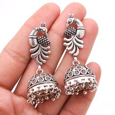 Peacock Silver Dangle Earring, Jhumka Silver Earring, Oxidized Dangle Drop Earring, 925 Sterling Silver Earring, Birthday Gifts  ✦ ✦ METAL DETAILS ✦ ✦  ✦ Metal : 925 Sterling Silver ✦ Earring Size : 57X22 mm  ✦ Total Weight : 31.79 Gram  ✦ Earring Box : Yes ✦ CUSTOMISATION DETAILS✦ We can customize any piece of fine jewelry. You can simply message us on Etsy or drop a text at +91-7357229656 (WhatsApp/I Message) to let us know about all the customization you want. Customization can include : ✦ Me I Message, Earring Box, Drop Earring, Silver Earring, Silver Earrings Dangle, 925 Sterling Silver Earrings, Sterling Silber, Favorite Jewelry, Jewelry Earrings Dangle