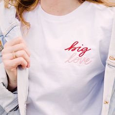 Big Love Big Love BIG LOVE Dope Tees, Funny T Shirt Sayings, Shirt Logo Design, Aesthetic T Shirts, Shirt Embroidery, Big Love, Triangle Shape, Embroidered Shirt, Handmade Clothes