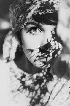 a black and white photo of a woman's face