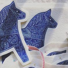 blue and white towels with horses on them