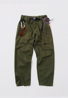 Gramicci Gadget Pant - Deep Green When you wear something by Gramicci, you're putting on over 30 years of innovation, experience and industry leadership. Sizing: Regular - Shop to size Materials: 100% Organic Cotton Twill Small = Mens 28-30 inch Medium = Mens 30-33 inch Large = Mens 33-36 inch - Washed for a vintage look and soft hand feel - Flexible waistband with easy-adjustable belt to optimise comfort - Large wrap around pockets - Low rise, slim fit, and slightly shorter hemline - D-ring with the logo on the right side - Great to hold all your gadets when climbing or in town ! Ripstop Pants, Wrap Shirt, Mens Pants Fashion, Lifestyle Clothing, Adjustable Belt, Soft Hand, Deep Green, D Ring, Mens Trousers