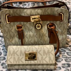 Michael Kors Hamilton Bag With Wallet. Firm Price Purse Is In Great Condition And Wallet Has A Little Bit Of Wear From Opening And Closing. The Bag Has Small Lip Stick Stains(Shown In Photo). Also All Items From My Closet Are Smoke Free Michael Kors Travel Wallets With Gold-tone Hardware, Beige Wallet With Gold-tone Hardware For Everyday, Michael Kors Brown Wallet With Removable Pouch, Leather Wallets With Branded Hardware For Everyday, Small Lips, Lipstick Stain, Michael Kors Hamilton, Michael Kors Bag, Michael Kors Monogram