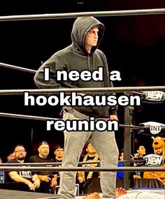 a man standing on top of a wrestling ring with the words i need a hookhaussen reunion