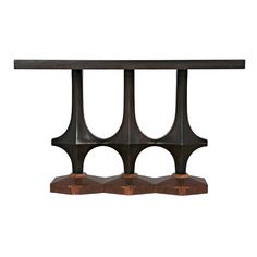 an iron and wood shelf with three sections on each side, one holding two wooden blocks