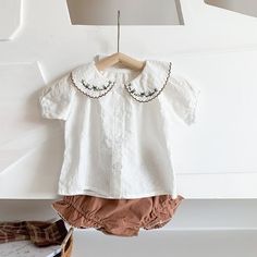 Add a touch of elegance to your little one's wardrobe with our Embroidered Two Piece Set! Crafted with intricate detailing, this set features charming embroidered patterns that bring a sense of whimsy to their look. The top offers comfort and style with its soft fabric and adorable design, while the matching bottoms provide versatility and ease of movement. Material: Cotton. Color: Brown. Shorts Embroidery, Embroidered Patterns, Embroidery On Clothes, Clothing Sets, Cheap Clothes, Two Piece Sets, Two Piece Set, New Girl, Soft Fabric