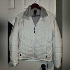 Women's White The North Face Puffer Jacket. Size Medium. Gently Used, Worn Only A Few Times.. Excellent Conditions. 3 Pocket, 2 Outside, 1 Inside. Siper Soft, Gray, Fuzzy Lining. The North Face Long Sleeve Winter White Outerwear, The North Face Long Sleeve Outerwear In Winter White, White The North Face Outerwear For Cold Weather, The North Face Puffer Jacket, The North Face Puffer, North Face Puffer Jacket, The North Face Jackets, North Face Jackets, North Face Jacket