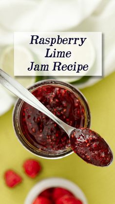 raspberry jam in a jar with a spoon