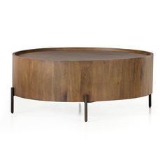 an oval wooden table with metal legs