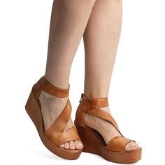 I33 Barclay Leather Platform Wedges Flattering, unique, and stylish! This strappy sandal has a special place with it's feminine yet daring details. The footbed provides comfort while the rest provide fashion at it's finest. The light wedge paired with the cut of the sandal create absolute perfection. Details Upper made of fine quality leather Insole is latex cushioned and coated in smooth breathable leather Height is 4 If you like Leather Platform WedgesMake a statement with your shoes! Explore Peep Toe Heels, T Strap, Platform Wedges, Strappy Sandals, Wedge Heels, Summer Style, Warm Weather, Leather Shoes, Summer Fashion