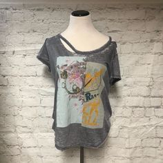 Gray T-Shirt Intentional Distressed Look. Rock Style Distressed Grunge Gray Tops, Gray Distressed Grunge Tops, Casual Distressed Gray Tops, Spring Grunge Short Sleeve Tops, Trendy Distressed Gray Tops, Trendy Gray Distressed Tops, Gray Distressed Tops For Summer, Trendy Graphic Print Short Sleeve Top With Relaxed Fit, Gray Grunge T-shirt For Spring