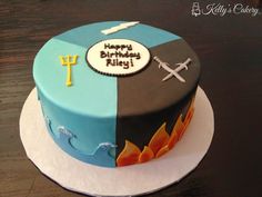 a birthday cake decorated with the colors of fire and ice