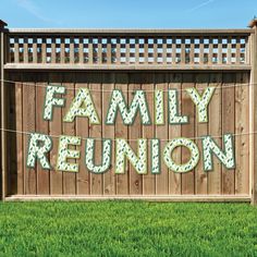 a family reunion banner hanging on a fence