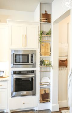 the kitchen is clean and ready for us to use it's oven, microwave, and pantry