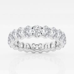 a white gold wedding ring set with round cut diamonds