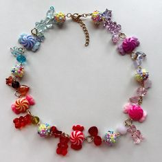 Please message me for details. Playful Dangle Charms Necklace, Cute Multicolor Jewelry With Lobster Clasp, Playful Dangle Charm Necklace, Playful Dangle Necklaces With Charms, Fun Multicolor Charm Jewelry, Playful Colorful Jewelry Gift, Cute Red Necklace For Parties, Kawaii Multicolor Party Jewelry, Sweet Multicolor Party Jewelry