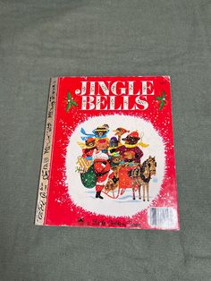 a book with an image of people dressed up as santa clause and reindeers on it