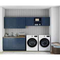 a laundry room with blue cabinets and washers