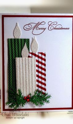 a christmas card with a lit candle on it