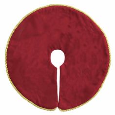 a red round cushion with gold rope around the edge and an oval hole in the middle