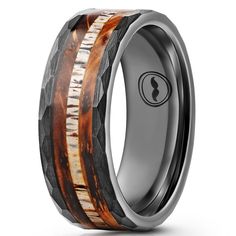 a wedding ring with an exotic wood inlay