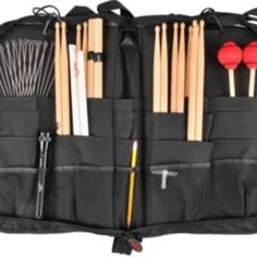 a black bag filled with lots of different types of utensils and spoons