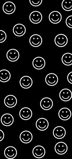 black and white smiley face wallpaper with lots of circles on the bottom right side