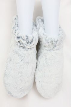 Step into coziness with Meya Plush Bootie Slippers; the perfect house shoes to keep you comfy and safe while you take life one step at a time! All in one size and three colors to choose from, these anti-skid booties will provide the luxurious look and feel you're looking for! Warm Comfy Slippers With Round Toe, Cozy Slippers With Soft Texture And Round Toe, Cozy Soft Booties With Round Toe, Cozy Gray Slippers With Round Toe, Soft Round Toe Slippers For Lounging, Winter Round Toe Booties, Cozy Round Toe Slippers For Loungewear, Comfortable Gray Winter Slippers, Comfortable Cozy Slippers With Faux Fur Lining