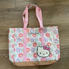 New Hello Kitty Large Floral Tote. 19 X 24 (With Handle). Playful White Bags For Spring, White Hello Kitty Print Shopping Bag, White Hello Kitty Shopping Bag, White Hello Kitty Print Bag, Everyday White Hello Kitty Bag, Playful White Bags With Hello Kitty Print, White Playful Hello Kitty Print Bags, Playful White Hello Kitty Print Bag, Cute White Bags For Spring