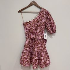 Jason Wu One-Shoulder Floral Puff-Sleeve Mini Dress New With Tags! A-Line With Flirty Ruffled Hem Size Small Adjustable Belt Around Waist Elastic Stretch Waistband Concealed By Belt One Shoulder, 3/4 Length Puff Sleeve Floral Pink And Brown Pattern Concealed Side Zipper Closure Fully Lined 96% Cotton, 4% Spandex Machine Washable Armpit To Armpit 16” Length From Shoulder To Hem 33” Keywords: Spring, Floral, Mini, Feminine, Luxury, Designer, Satin, Revolve, Chic, Elegant, Sophisticated, Romantic, Jason Wu Dress, Feminine Luxury, Mini Dress Pink, Elegant Sophisticated, Brown Pattern, Pink And Brown, Jason Wu, Adjustable Belt, Mini Dress With Sleeves