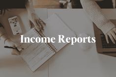 two people sitting at a table with laptops and papers in front of them that says, income reports