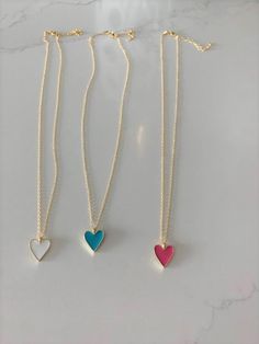 Enamel Heart Charm Necklace, Lovely Heart Pendant Necklace, 18K Gold over Genuine Sterling Silver, Excellent Quality, Pink Heart, Blue Heart-----------------------------------------------------------------------------------------Beautiful enamel heart charm necklace great for everyday wear. It compliments any outfit and comes at a great affordable price. A wonderful gift for yourself or for any loved one and friend - purchase one today!♦ Materials: Sterling Silver, 18K Gold, Enamel♦ Available co Blue Heart Charm Necklace For Mother's Day, Blue Heart Pendant Necklace For Mother's Day, Dainty Blue Heart-shaped Necklace, Pink Heart Necklace As Gift For Mom, Pink Heart Necklace For Mom, Cute White Heart Pendant Jewelry, Dainty Blue Necklace For Valentine's Day, Valentine's Day Multicolor Charm Necklaces, Personalized Blue Heart Necklace