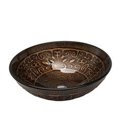 a brown and black bowl shaped sink on a white background with an intricate design in the center