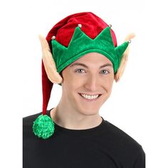 Looking for a little Christmas cheer? This soft elf hat is sure to put you in the holiday spirit! The red base, chenille pom pom, and green jagged trim are full of festive fun, and the little bells add an extra fun little touch to the hat. The soft elf ears are perfect for anyone who wants to really bring their elf costume to the next level, and the hidden pocket in the lining is ideal for keeping your ID or cash safe. Only an elf could come up with something so clever! Elf Hat With Ears, Kiss Costume, Troll Costume, Hat With Ears, Holiday Hats, Elf Costume, Elf Ears, Holiday Costumes, Scary Costumes