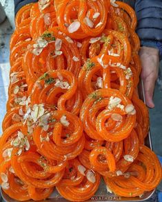 there are many orange rings on the tray