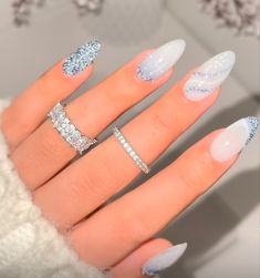 Nails Xmas 2023, White Festive Nails, Blue Glitter Winter Nails, Blue And White Glitter Nails, Winter Acrylic Nails Almond, Nails Glitter Christmas, Blue And White Christmas Nails, Blue Nails Christmas, New Year’s Nails