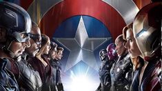 the avengers team is standing in front of an iron man and captain america symbol with their hands together