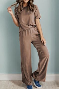 Features: Basic style Number of pieces: Two-piece Stretch: Slightly stretchy Material composition: 65% polyester, 30% viscose, 5% elastane Care instructions: Machine wash cold. Tumble dry low. Imported Product measurements:S:Bust 38.19 in, Waist 26.77 in, Shoulder 15.16 in, Sleeve Length 9.45 in, Top Length 25.00 in, HIP 38.58 in, Bottom Length 42.32 inM:Bust 40.55 in, Waist 28.74 in, Shoulder 15.75 in, Sleeve Length 9.65 in, Top Length 25.79 in, HIP 40.94 in, Bottom Length 42.72 inL:Bust 42.91 Versatile Solid Color Viscose Pants, Stretch Solid Color Pants For Loungewear, Versatile Solid Viscose Pants, Stretch Solid Color Lounge Pants, Casual Solid Viscose Bottoms, Stretch Viscose Pants For Loungewear, Casual Stretch Viscose Pants, Casual Brown Elastane Bottoms, Casual Solid Color Viscose Pants