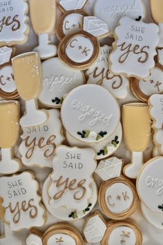 some cookies that have been decorated to look like bride and groom's names on them