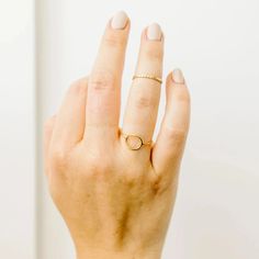 This is one of our favorite rings! It's just such a cool shape. Adjustable Initial Ring For Everyday, Adjustable 14k Gold Midi Rings, Gold Crystal Ring With Round Band For Everyday, Modern Everyday Crystal Ring, Minimalist Adjustable Crystal Ring With Round Band, 14k Gold Crystal Ring For Everyday, Minimalist Gold Stackable Rings With Halo, Simple 14k Gold Filled Round Rings, Minimalist Gold Halo Rings