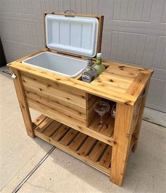 an outdoor cooler with drinks in it