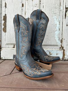 A nod to traditional Western style, Hazen pairs a walkable heel with all-over stitching. It's a works-with-everything boot you can dress up (say with a flowy, romantic dress) or down (a graphic tee and jeans). Shaft Height - 12" Circumference - 14" Heel - 1.5" X Toe ATS® technology provides ergonomic support on uneven terrain Leather lining Hand nailed, color stained Veg Tan leather sole Resoleable Goodyear leather welt construction Five-row stitch pattern 5.24 Snip Toe Cowgirl Boots, Blue Cowboy Boots, Whisky Barrel, Ariat Boots, Western Store, Boot Companies, Cowgirl Western, Western Hats, Veg Tan Leather