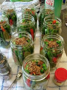 there are many jars with food in them