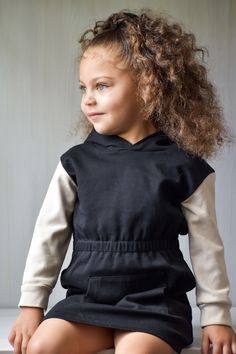 It’s a hoodie and it’s a dress! And it’s absolutely as awesome as it sounds. Made of 100% cotton, the Color Block Sweatshirt Dress is stylish and comfortable —perfect for wearing on its own or layering over leggings or tights. It’s sure to be a one of your little ones favorites in their closet! Casual Black Sweatshirt Dress For Fall, Fall Cotton Sweatshirt Dress For Loungewear, Cotton Sweatshirt Dress For Loungewear In Fall, Cotton Sweatshirt Dress For Fall Loungewear, Winter Cotton Sweatshirt Dress With Drawstring Hood, Casual Cotton Sweatshirt Dress For Fall, Casual Cotton Sweatshirt Dress With Drawstring Hood, Cotton Hooded Sweatshirt Dress For Loungewear, Cotton Sweatshirt Dress With Drawstring Hood For Fall