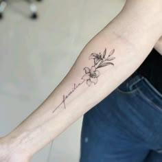 a person with a tattoo on their arm