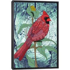 a red bird sitting on top of a green leafy tree branch next to a piece of wood