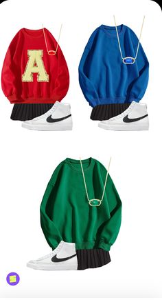 three different colored sweatshirts with the letter a on them, one in red and one in green